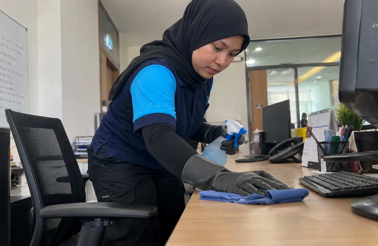 Office cleaning in a corporate workplace